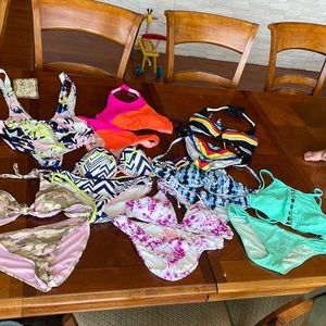 7 bikinis and 1 bottom with suspenders. Victoria secret 7 and 1 h and m